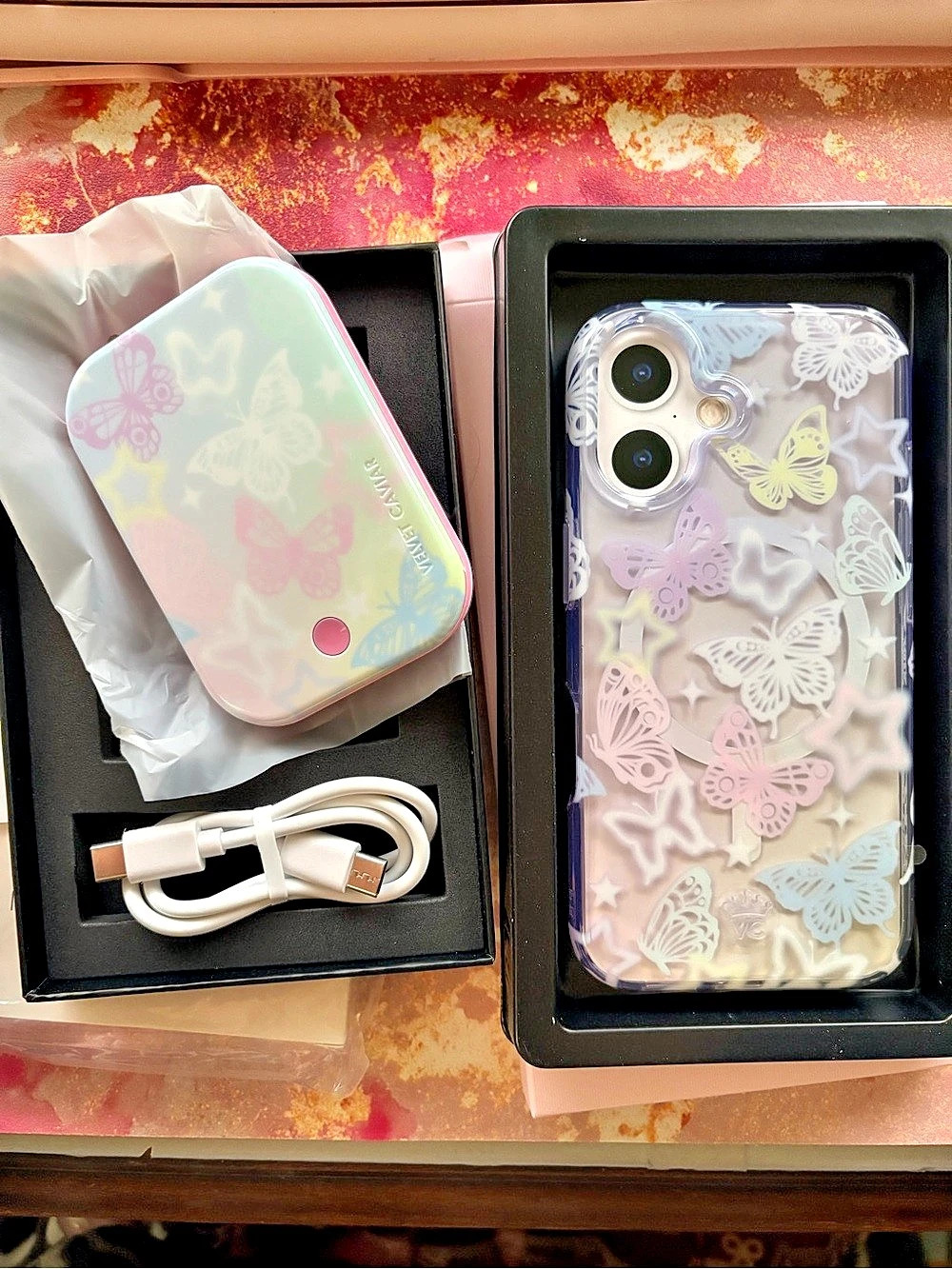 Velvet Caviar Aura Butterfly Phone Case and Portable MagSafe Charger Power Pack